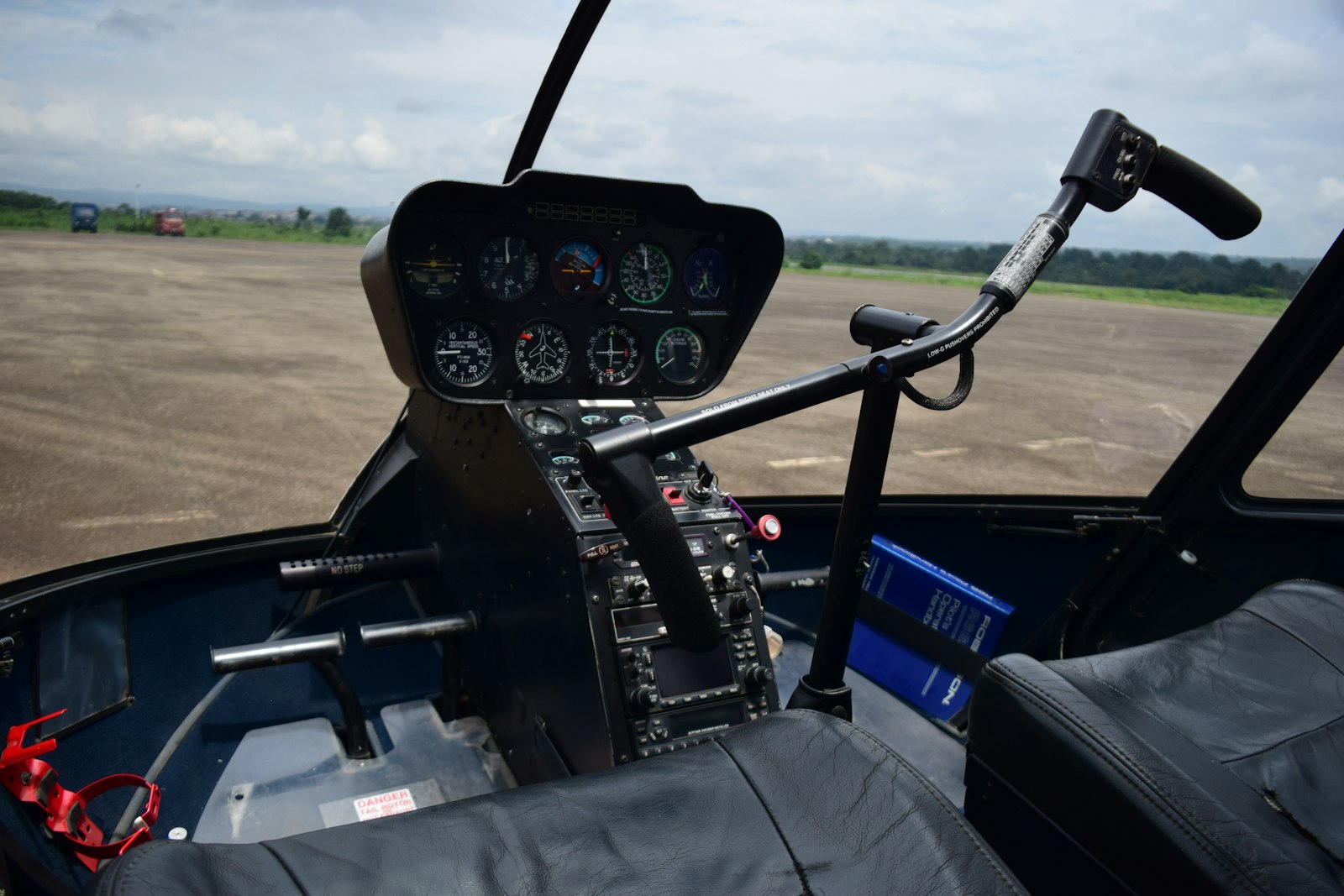 View through the windscreen from the cockpit of a small general aviation aircraft