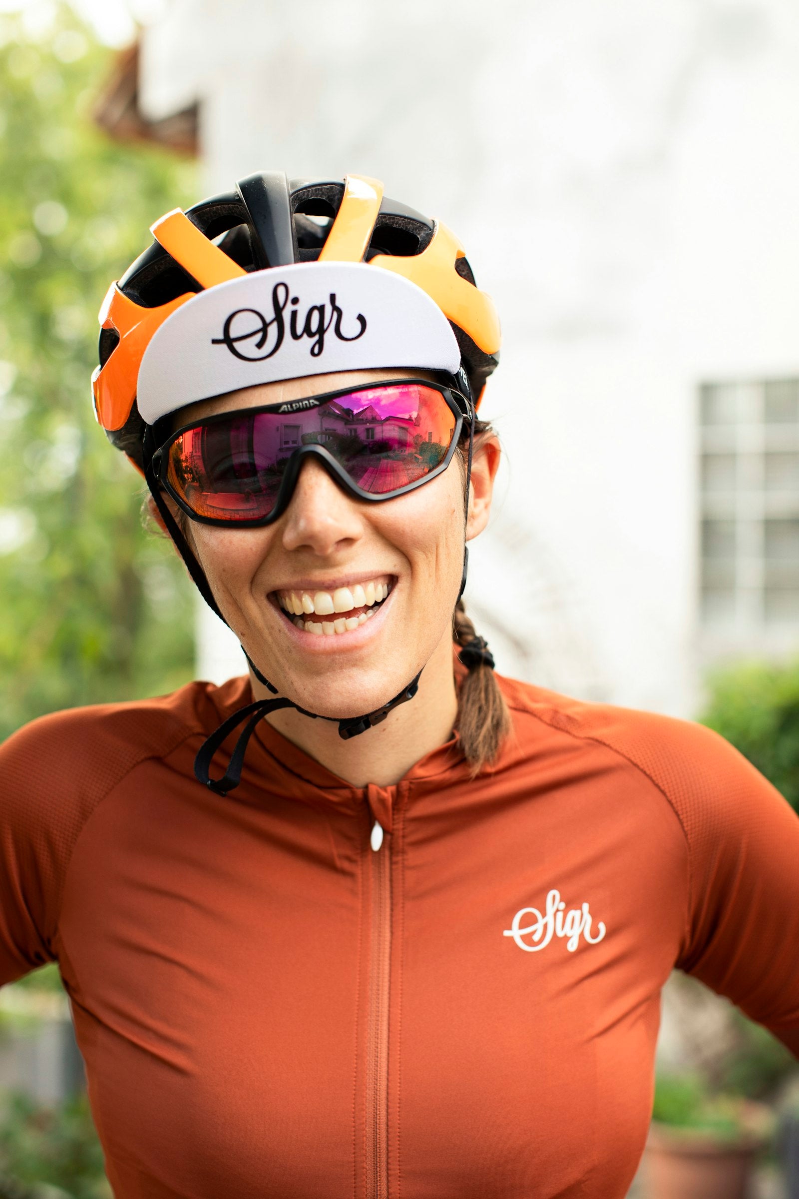 Road cyclist in helmet and sunglasses on a bike with clear, fog-free lenses