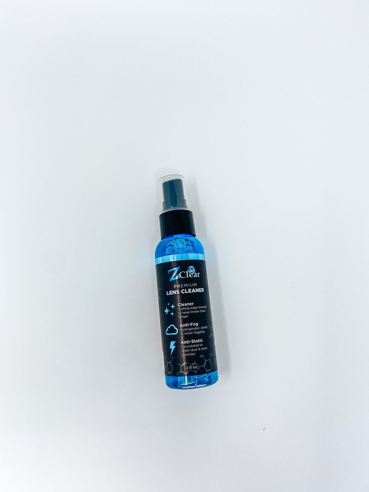 Z Clear 2oz anti-fog lens cleaner spray paired with included microfiber towel